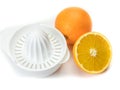 Juicer with oranges white background Royalty Free Stock Photo