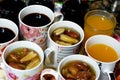 Juices, drinks and compotes tray on the iftar table in Ramadan month with dates, dried fruits figs, apricot, raisins compote