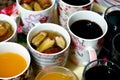 Juices, drinks and compotes tray on the iftar table in Ramadan month with dates, dried fruits figs, apricot, raisins compote