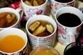 Juices, drinks and compotes tray on the iftar table in Ramadan month with dates, dried fruits figs, apricot, raisins compote