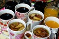 Juices, drinks and compotes tray on the iftar table in Ramadan month with dates, dried fruits figs, apricot, raisins compote