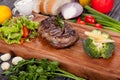 Juicy and appetizing steak tamogavok of horse meat on the table Royalty Free Stock Photo