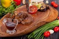 Juicy and appetizing steak tamogavok of horse meat on the table Royalty Free Stock Photo