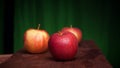 Juicy apples on a wood desk Royalty Free Stock Photo