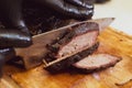 Juicy beef brisket on chopping block Royalty Free Stock Photo