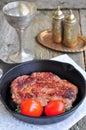 Juicy beef steak in a frying pan Royalty Free Stock Photo