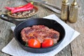 Juicy beef steak in a frying pan Royalty Free Stock Photo