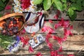 Juicy black grapes and apples, pears and peaches in a basket in the garden on an old wooden table, Royalty Free Stock Photo