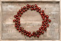 Juicy cherry on a light wooden background, cherry fresh, lined in a circle