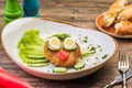Juicy delicious meat fried cutlets with hot mashed potatoes, green lettuce leaves, on a white plate. Royalty Free Stock Photo