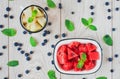 Juicy and Delicious watermelon and  melon cubes, blueberry and mint leaves Royalty Free Stock Photo