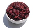 Juicy dried cranberries on white background