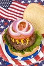 Juicy fourth of July hamburger Royalty Free Stock Photo