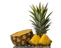 Juicy fresh pineapple cut into slices isolated on white Royalty Free Stock Photo