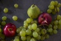 Juicy fruits on dark background