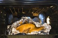 Juicy golden chicken in oven