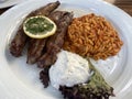 Grilled Lamb with Tomato Pasta, also known as Greek Kritharaki, Tzatziki with Yogurt, Cucumber, Garlic, Olive Oil and Lemon.