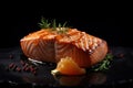 Juicy grilled piece of salmon and wine on the table in the restaurant Royalty Free Stock Photo