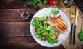 Juicy grilled pork steak with herbs on bone Royalty Free Stock Photo