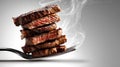 Juicy grilled steak slices stacked on a fork with rising smoke Royalty Free Stock Photo