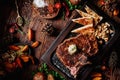 Juicy grilled steak T-Bone on dark board with mushrooms and fried pita bread Royalty Free Stock Photo