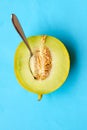 A juicy honeydew melon and a spoon Royalty Free Stock Photo