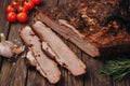 Juicy hunk of smoked meat on a wooden background. BBQ