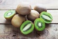 Juicy kiwi fruit on wooden background Royalty Free Stock Photo