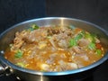 Juicy lamb stew with chopped onions and tomatoes