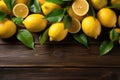 Juicy lemons on a wooden background, top view. Copy space.