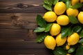 Juicy lemons on a wooden background, top view. Copy space.