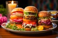Juicy multilayered burgers with sesame seed hamburger buns, on a plate Royalty Free Stock Photo