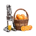 Juicy orange and a manual mechanical squezeer