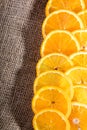 Juicy orange slices on jute bag Royalty Free Stock Photo