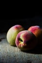 Juicy peaches in old wooden tray Royalty Free Stock Photo