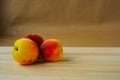 Juicy peaches on a wooden table Royalty Free Stock Photo