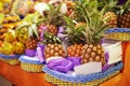 Juicy pineapples for sale. baskets of pineapples at a food market. Royalty Free Stock Photo