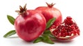 Juicy pomegranate and its half with leaves Royalty Free Stock Photo