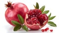 Juicy pomegranate and its half with leaves Royalty Free Stock Photo