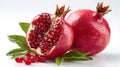 Juicy pomegranate and its half with leaves Royalty Free Stock Photo