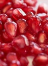 Juicy pomegranate seeds cells arils macro closeup Royalty Free Stock Photo