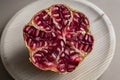 Juicy pomegranates. Red ripe pomegranates closeup view. Macro view of organic pomegranates seeds texture. Royalty Free Stock Photo