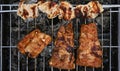 Juicy Pork steak, ribs and chicken meat on bbq grill, homemade barbecue, closeup Royalty Free Stock Photo