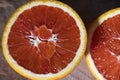 Juicy red orange cut in half lying on the Sunlight