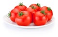 Juicy red tomatoes white plate isolated on white background Royalty Free Stock Photo