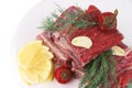 Juicy ribs with lemon on whitedish Royalty Free Stock Photo