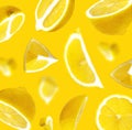 Juicy ripe flying lemons on yellow background. Creative food concept. Tropical organic fruit, citrus, vitamin C. Lemon whole and Royalty Free Stock Photo