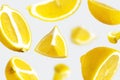 Juicy ripe flying yellow lemons on light gray background. Creative food concept. Tropical organic fruit, citrus, vitamin C. Lemon Royalty Free Stock Photo