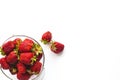 Juicy ripe strawberries in a bowl, isolated on a white background with space for text Royalty Free Stock Photo