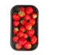 Ripe strawberry in black container on white background Royalty Free Stock Photo